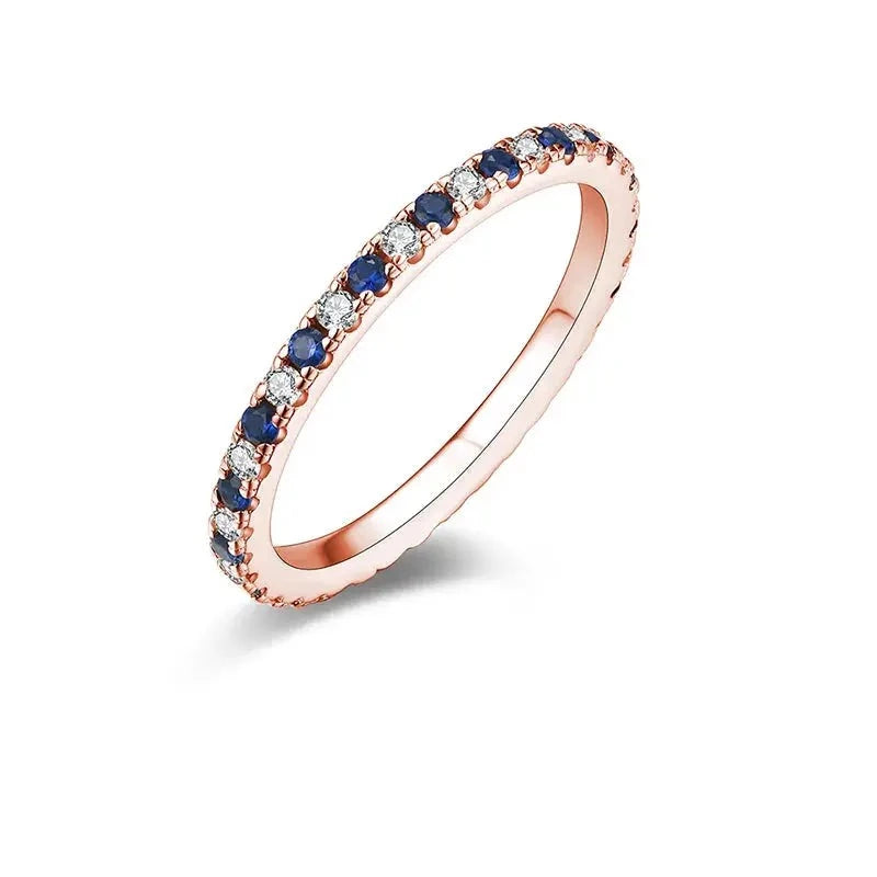 Gold or Silver 1.5mm Moissanite Eternity Ring with Blue Sapphire  .5ctw Moissanite Engagement Rings & Jewelry | Luxus Moissanite