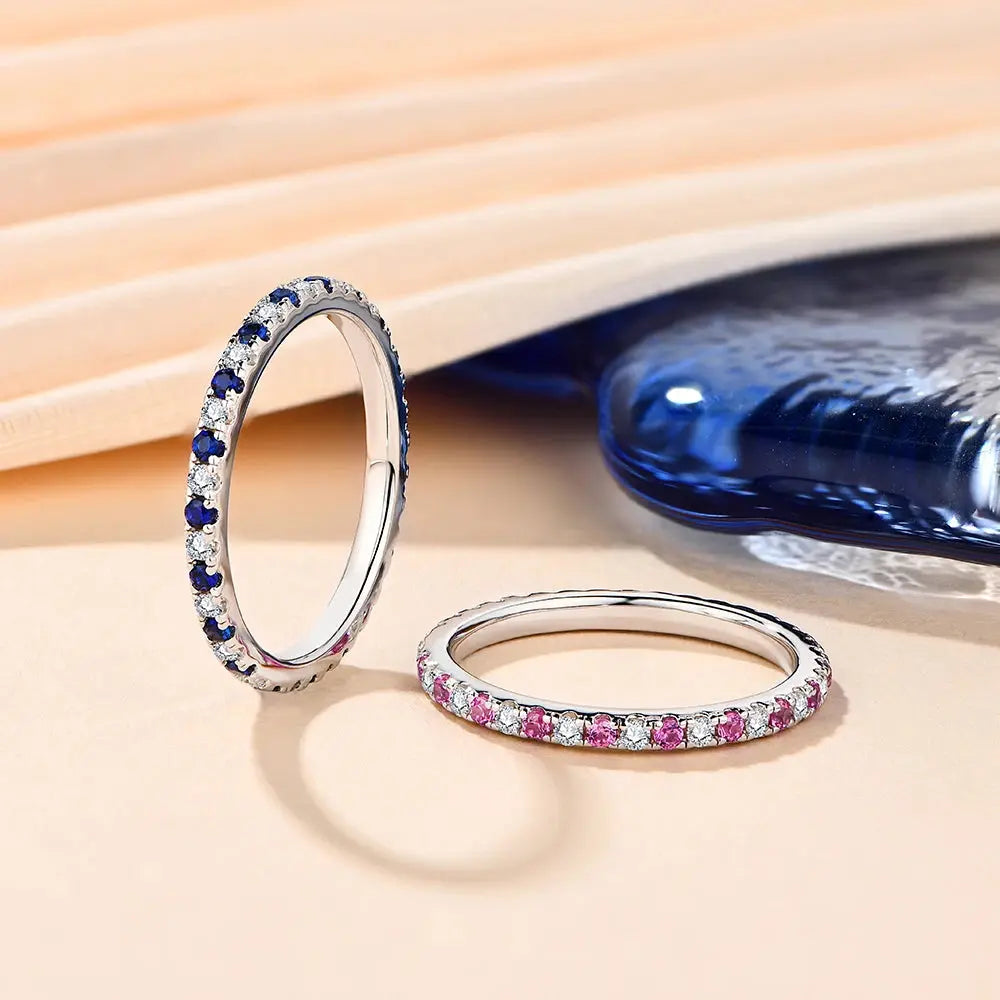 Gold or Silver 1.5mm Moissanite Eternity Ring with Pink Sapphire Colors .5ctw Moissanite Engagement Rings & Jewelry | Luxus Moissanite