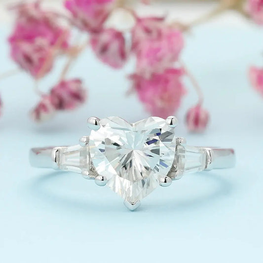 PLATINUM PLATED HEART SHAPED THREE STONE MOISSANITE ENGAGEMENT RING 2CT Moissanite Engagement Rings & Jewelry | Luxus Moissanite