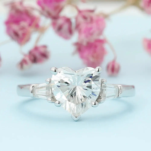 PLATINUM PLATED HEART SHAPED THREE STONE MOISSANITE ENGAGEMENT RING 2CT Moissanite Engagement Rings & Jewelry | Luxus Moissanite