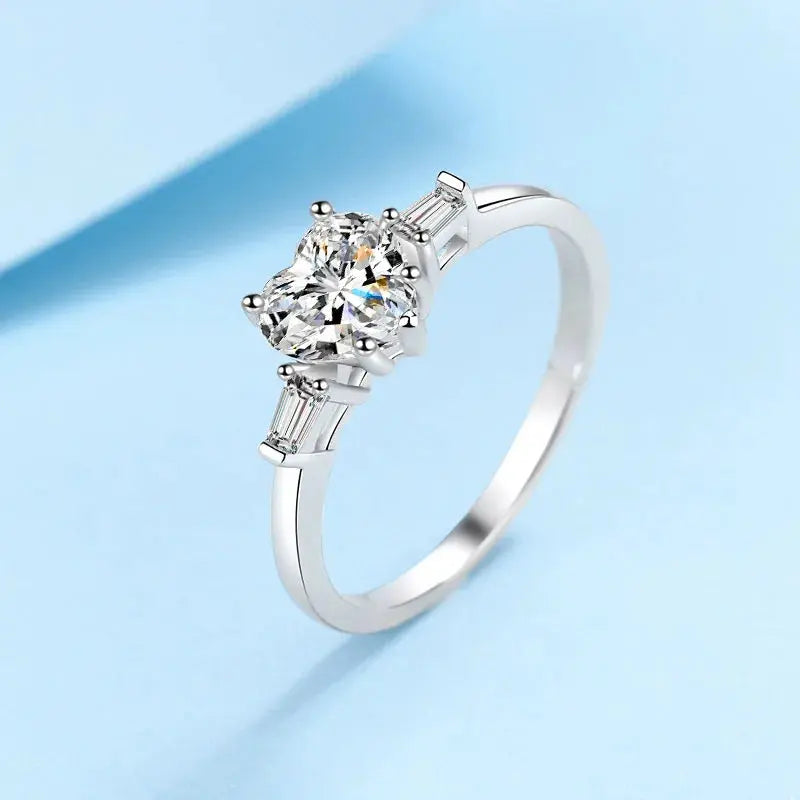 Platinum Plated Silver 3 Stone Heart Moissanite Ring 1.2ct Total Moissanite Engagement Rings & Jewelry | Luxus Moissanite